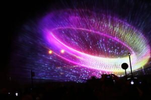 Colourful Lú Festival of Light projection illuminating a building in Drogheda at night