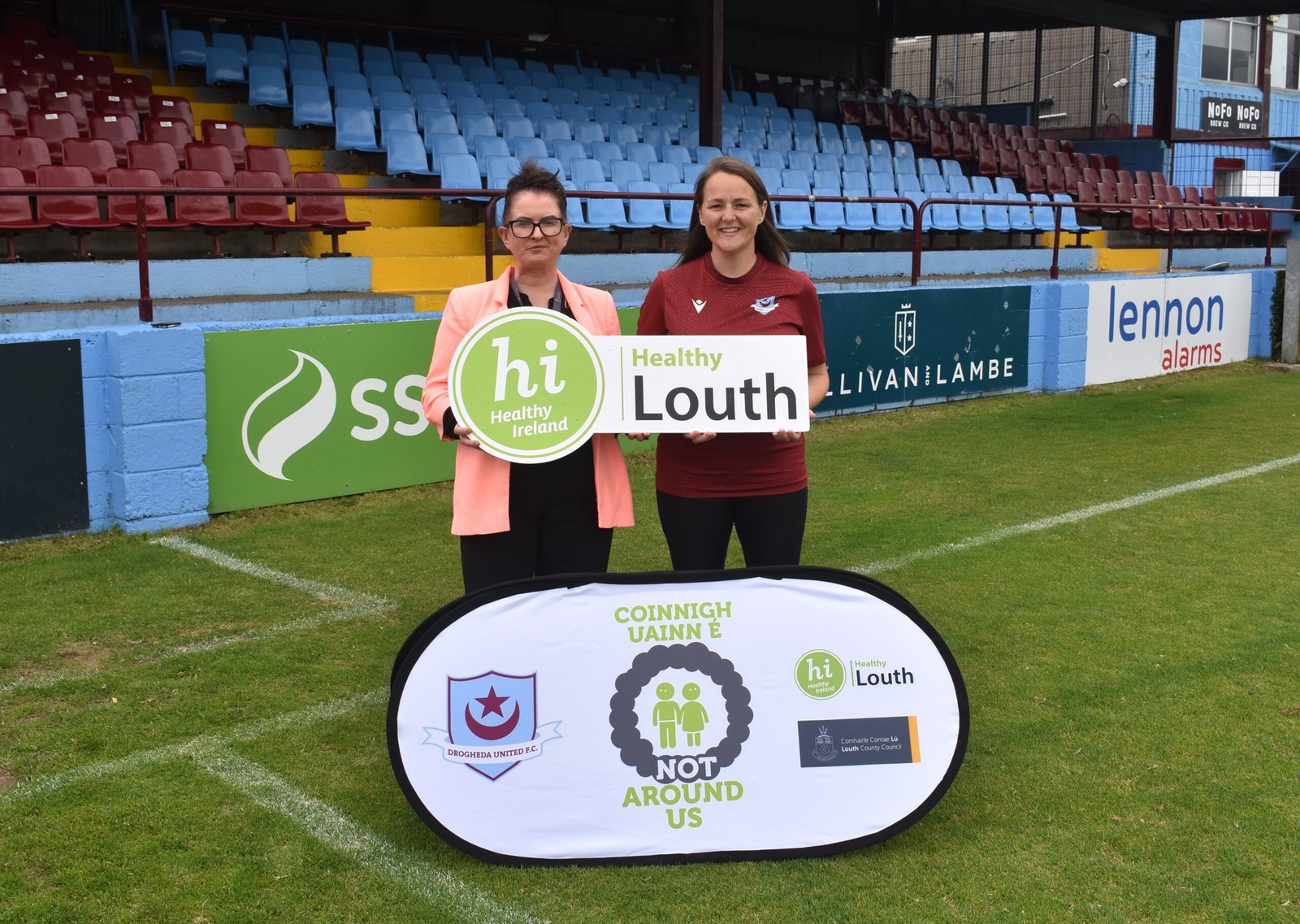 Healthy Louth and Drogheda United representatives promoting the Not Around Us campaign at Sullivan and Lambe Park
