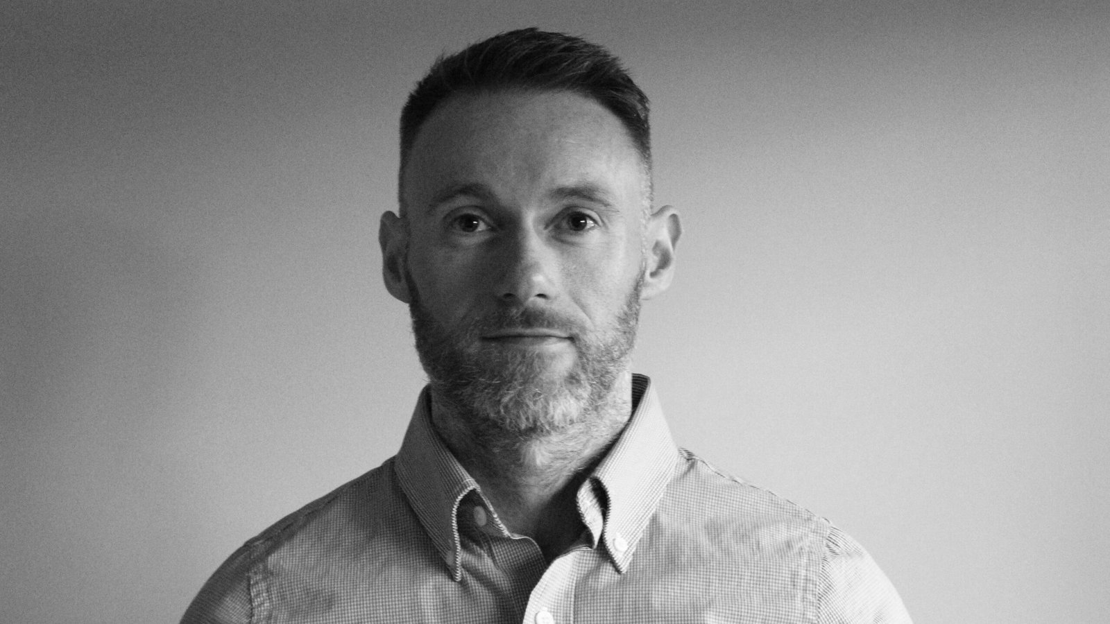 Colin Thornton, who is a finalist in the Best Feature Film Script category at the 2026 Writers’ Guild of Ireland Zebbie Awards for Four Mothers. Colin Thornton pictured in a black and white portrait