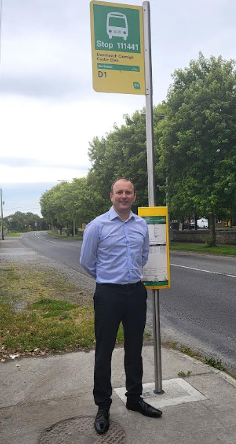 Cllr Stephen McKee beside a bus stop in Donacarney, East Meath.