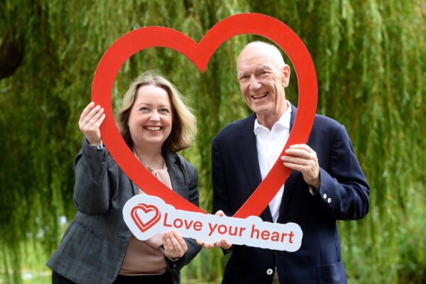Mark Sherry pictured with an Irish Heart Foundation Love Your Heart campaign sign