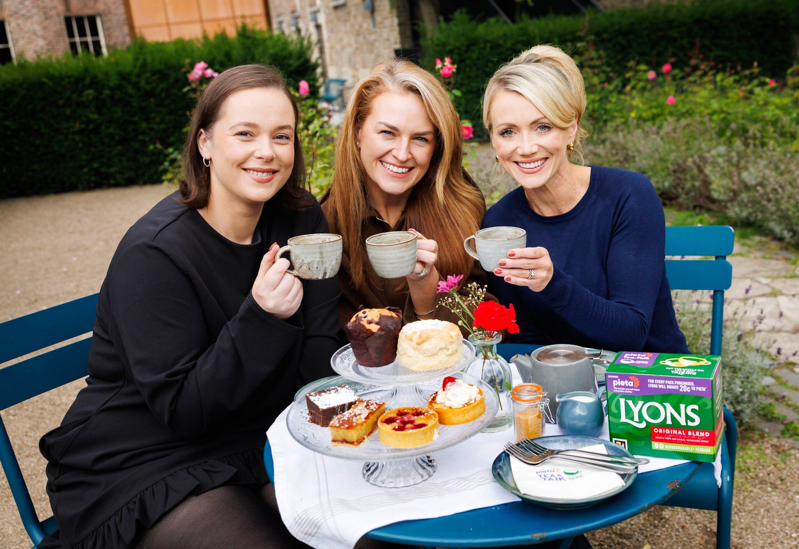 Three women sharing tea as part of Pieta’s Tea & Talk campaign with Lyons Tea