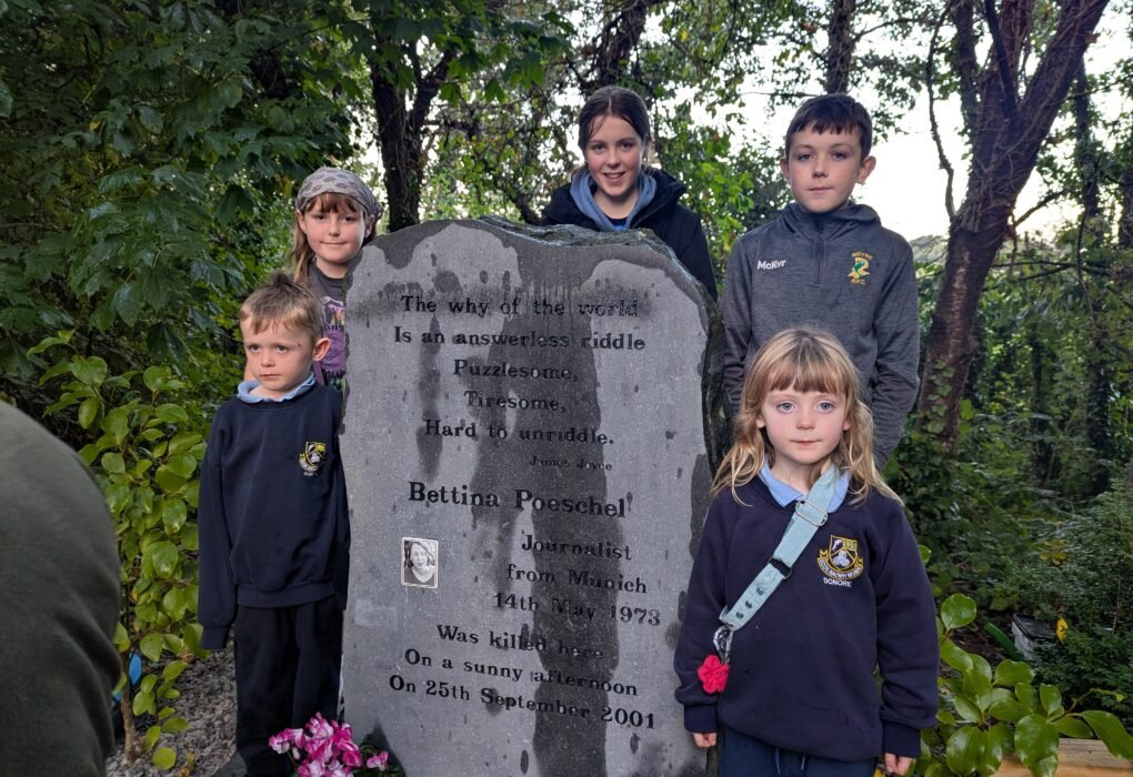 Children gathered beside the memorial to Bettina Poeschel in Donore