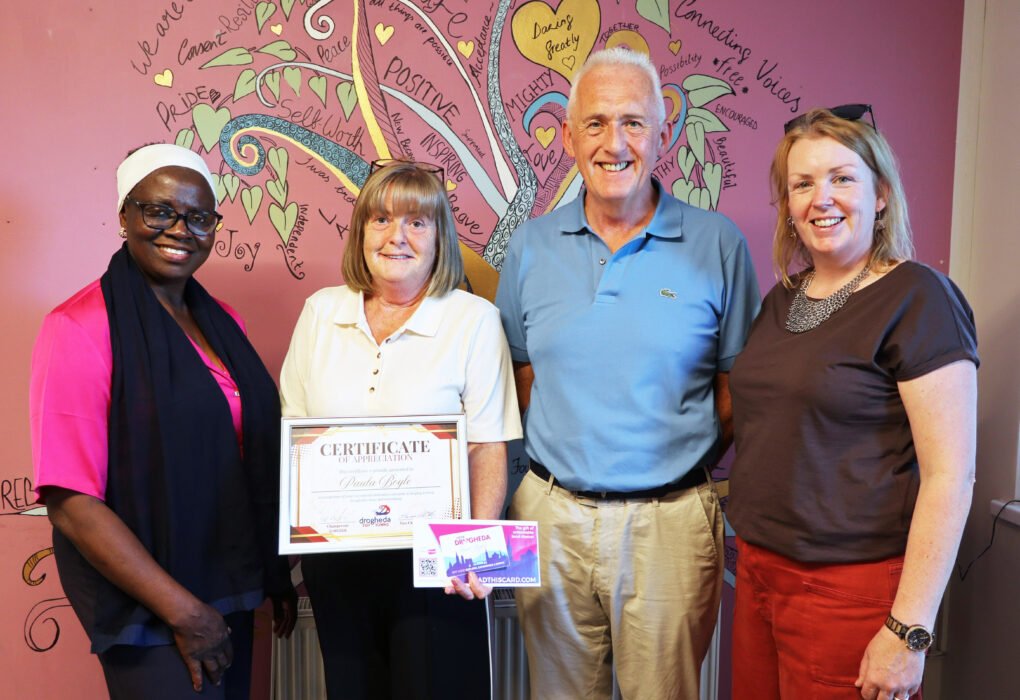 Paula Doyle receiving a Drogheda Tidy Towns community award in Moneymore