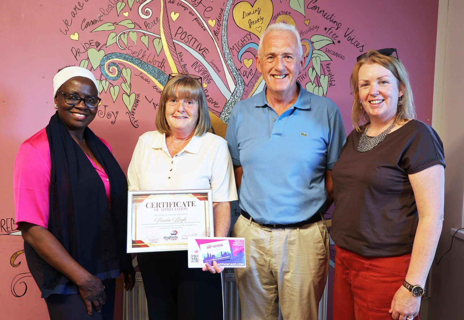 Paula Doyle receiving a Drogheda Tidy Towns community award in Moneymore