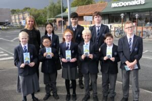 Dundalk Grammar School pupils and staff promoting the Park ‘n’ Stride initiative during Road Safety Week