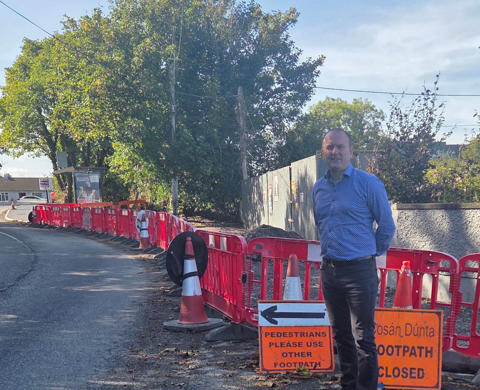 Cllr Stephen McKee beside footpath works in Donacarney, Co Meath