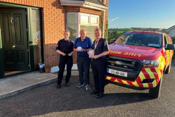 Meath County Council firefighters carrying out a home fire safety visit in Nobber during Fire Safety Week