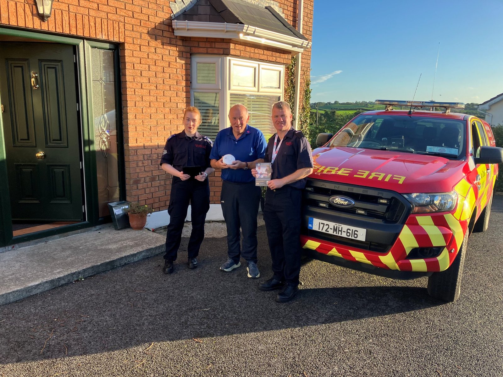 Meath County Council firefighters carrying out a home fire safety visit in Nobber during Fire Safety Week