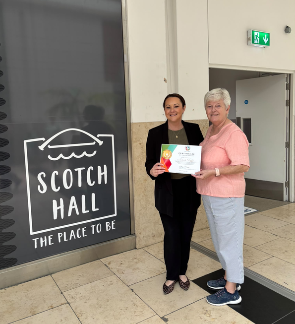Nichola Kelly and Ann Short at Scotch Hall in Drogheda holding a dementia awareness certificate