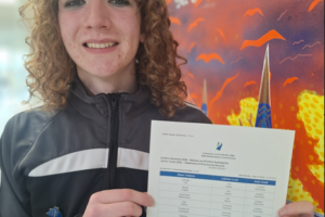 Ruairí Heeney of St Oliver’s Community College in Drogheda holding his Junior Cycle results after achieving Distinctions in all nine subjects
