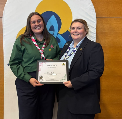 Rachel Doyle receiving her Golden Sun Award from Irish Girl Guides Chief Commissioner Aisling Claffey Healion