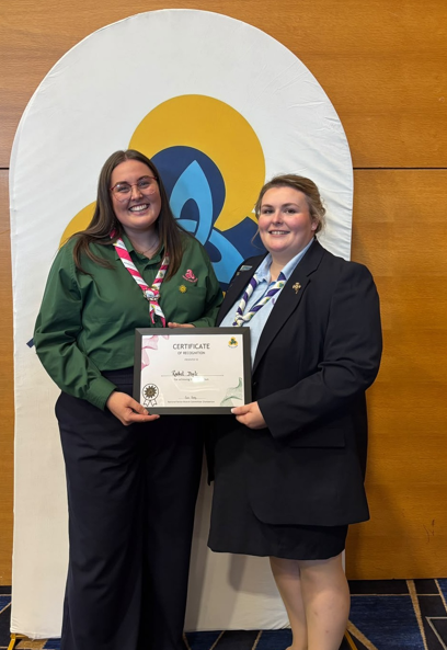 Rachel Doyle receiving her Golden Sun Award from Irish Girl Guides Chief Commissioner Aisling Claffey Healion
