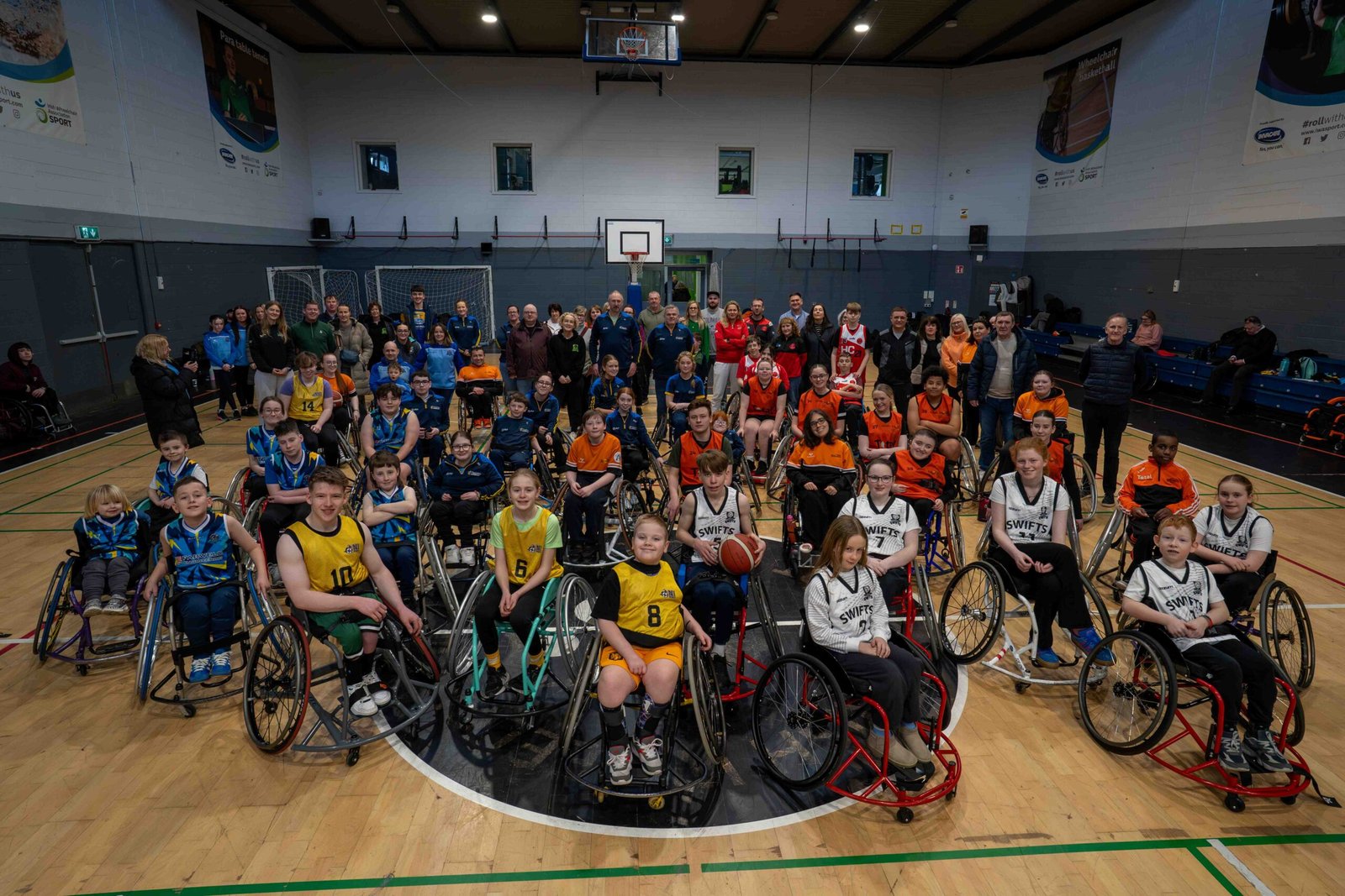 Wheelchair sports clubs from across Ireland pictured at an IWA-Sport competition earlier this year. Wheelchair basketball players and supporters gathered at an IWA-Sport competition